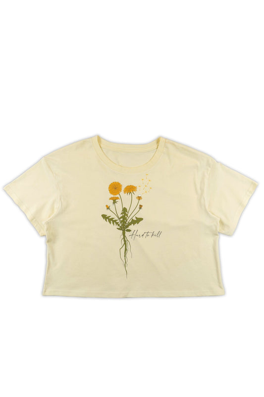 Beige t-shirt with dandelion design and "Hard to kill" text on a white background