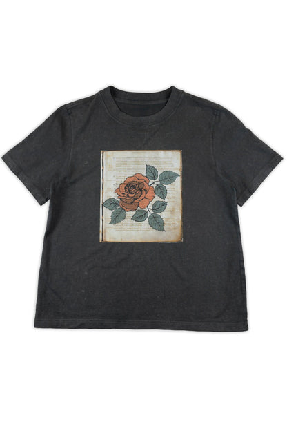 Black t-shirt with a floral design on a white background